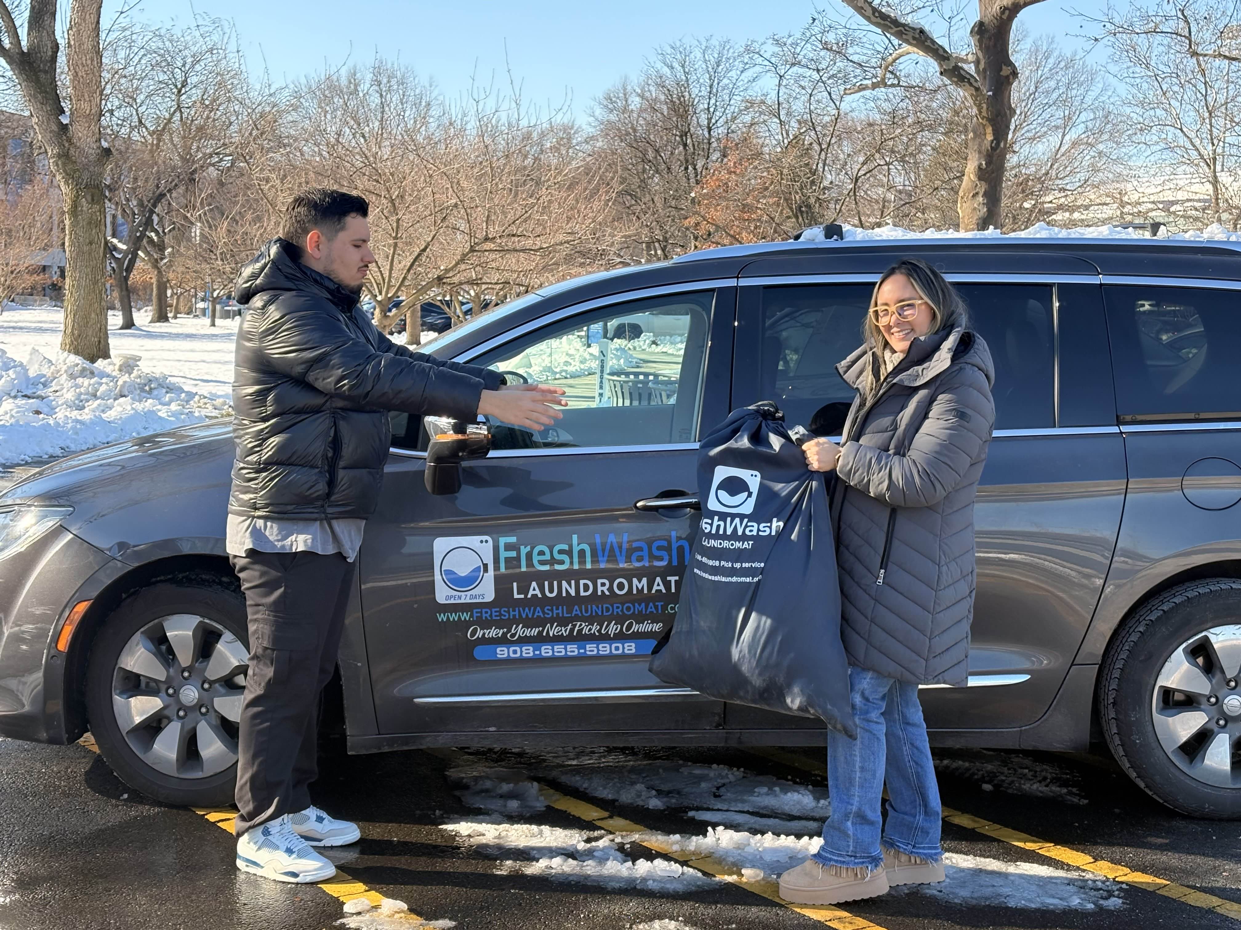 Delivery van picking up laundry